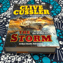 Load image into Gallery viewer, The Storm: A Kurt Austin Adventure by Clive Cussler and Graham Brown